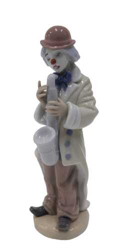 A Lladro figure group Sad Sax, number 5471, 21cm high.