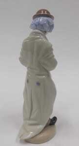 A Lladro figure group Sad Sax, number 5471, 21cm high. - 2