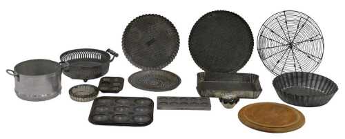 A quantity of English and Continental galvanised cooking related items, to include flan moulds,...