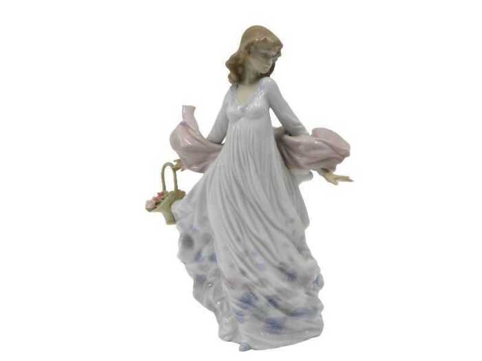 A Lladro figure group Spring Splendour, 29cm high. (boxed)