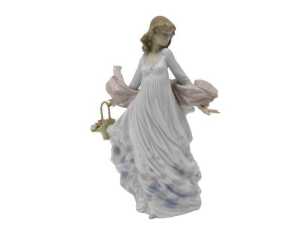 A Lladro figure group Spring Splendour, 29cm high. (boxed)