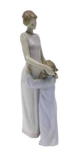A Lladro figure group Someone To Look Up To, original cost &pound;199, 35cm high. (boxed)