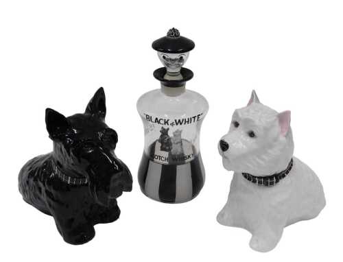 A Royal Adderley liquor bottle advertising Black and White whisky dog figure, another, and a...