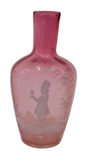 An early 20thC cranberry Mary Gregory style glass vase, of shouldered form, etched with child...