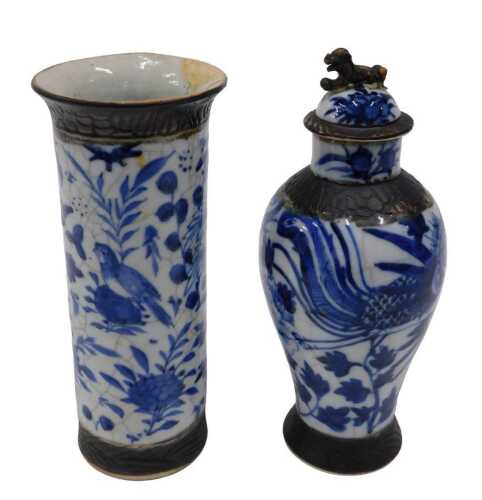A Chinese blue and white crackle glazed pottery vase, with an upper and lower geometric floral...