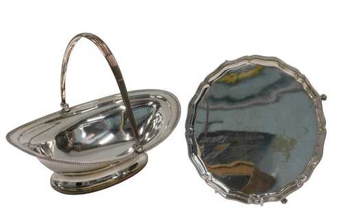A 19thC Old Sheffield plate basket, of ellipse form, with swing strapwork handle, on oval foot,...
