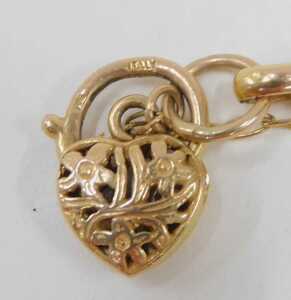 A charm bracelet, with a 9ct rose gold curb link bracelet with safety chain and heart shaped... - 3