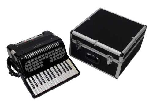A mid 20thC Gallini Italian accordion, in black and white chrome finish, with twenty four stops,...