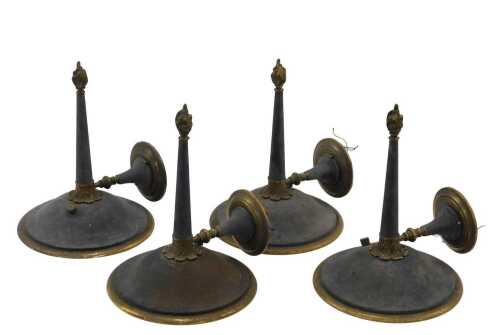 A set of four gilt metal angular wall sconces, each with circular dish tops, and acanthus topped...