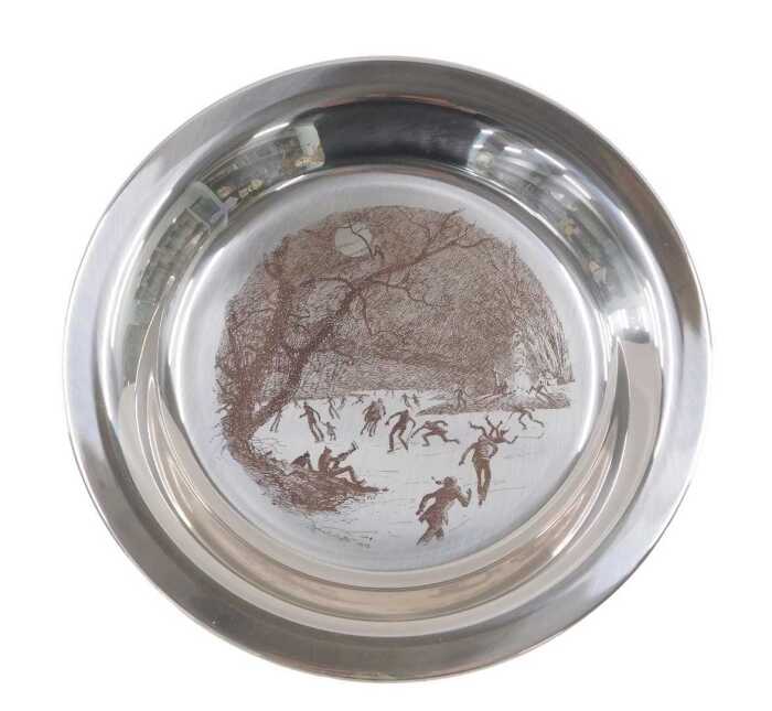 An Elizabeth II silver Skating on the Brandywine plate, of circular form, etched with scene,...
