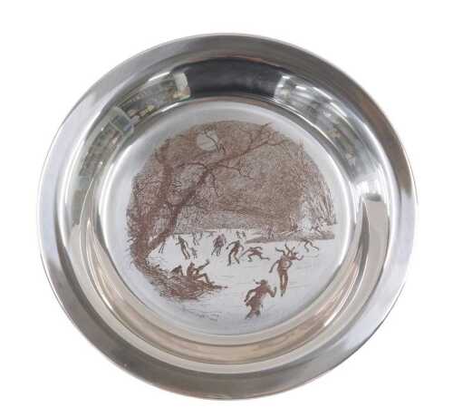 An Elizabeth II silver Skating on the Brandywine plate, of circular form, etched with scene,...