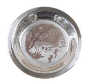 An Elizabeth II silver Skating on the Brandywine plate, of circular form, etched with scene,...