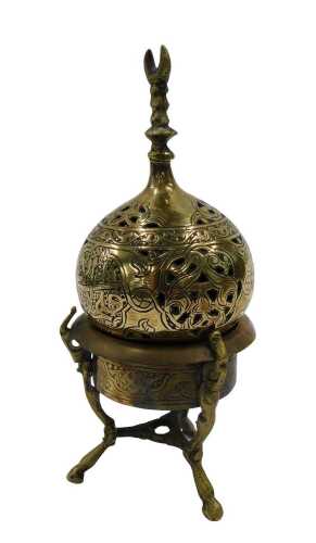 An early 20thC Cairoware style Islamic incense burner, in two parts, the upper section with...