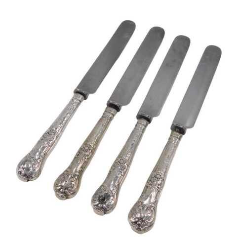 A set of four Harrison Brothers GR table knives, each with silver core handles, King's pattern,...
