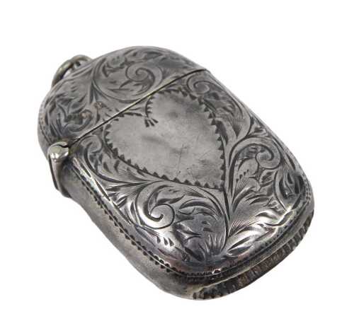 A Victorian silver Vesta case, of oblong form with ring top, match strike base etched with...