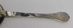 An early 18thC rattail trefid spoon, with plain bowl and stem, marks rubbed, probably Queen Anne,... - 2