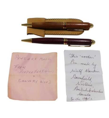 A Mont Blanc style ballpoint pen, with turned opening and gilt trim, 15cm high, another similar...