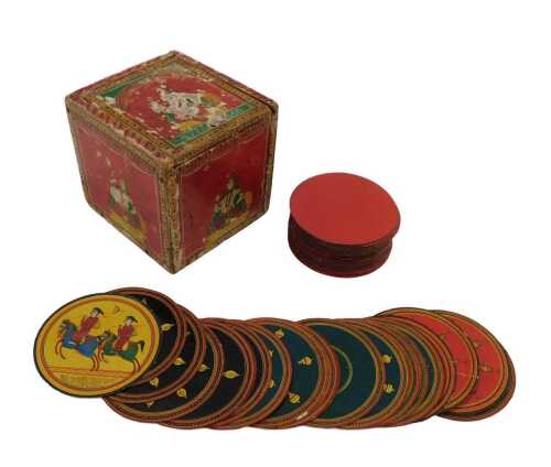 A set of Ganjifa Ganjapa Indian playing cards, 8cm diameter, completeness unknown, boxed,...