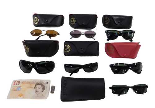 Various Ray Ban marked spectacles and cases, a Charles Darwin ten pound note and various...