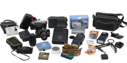 Various cameras and related items, a Praktica NTL3, 10cm high, various other cameras, Olympus...