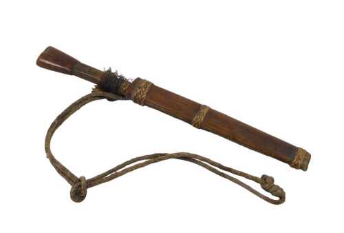 An early 20thC Malaysian style dagger and scabbard, with shaped blade, turned handle and bamboo...