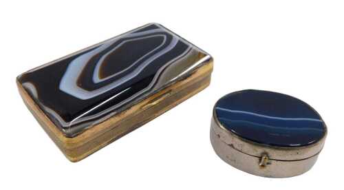 A 19thC banded agate snuff box, of rectangular form with thumb mould handle, gilt coloured metal...