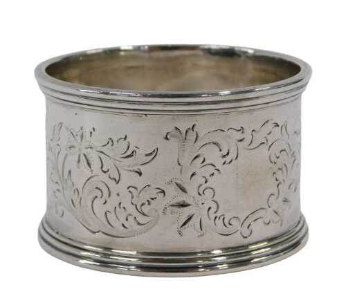 A George VI silver napkin ring, of circular form, part etched with scrolls, leaves and flower...