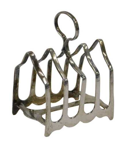 A George V silver four section toast rack, with ring handle and shaped feet, numbered 7859, by...