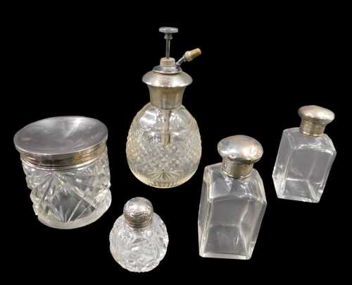 A George V silver cut glass dressing table jar, with plain lid, on circular body hobnail cut,...