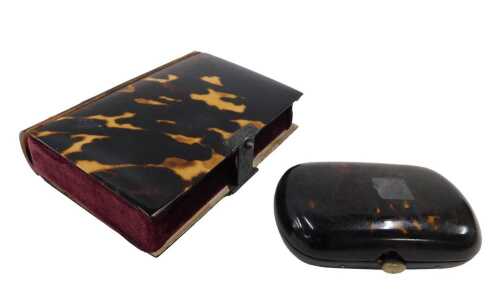 A 19thC tortoiseshell sewing box, formed as a book with elaborate metal clasp, initialled GB,...