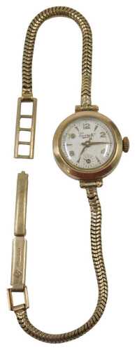 A 9ct gold Everite lady's wristwatch, the small silvered watch head with baton and numeric dial,...