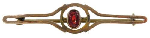 A garnet set bar brooch, yellow metal unmarked on plated pin back, 4.5cm wide, 1.8g all in.
