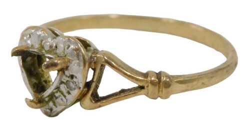 A 9ct gold dress ring, the ring mount lacking stone, 1.8g. (AF)