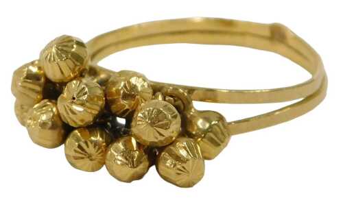 A ball design dress ring, the central section with layered chain ball links, on two splayed band,...