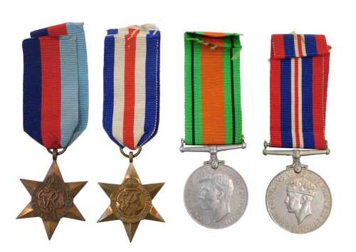A group of medals, consisting of the 39-45 Star, the France and Germany Star, Defence medal, and...