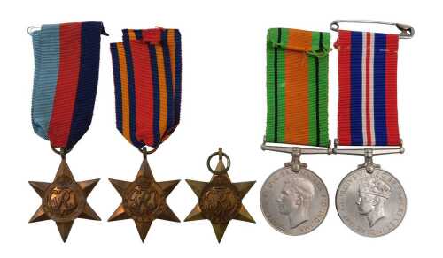 A group of WWII medals, to include The 39-45 star, Africa star, Burma star, Defence medal and...