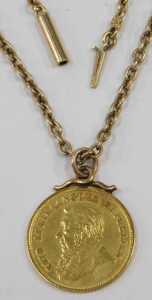 A South African Half Pond gold coin pendant and chain, dated 1896, with a rose gold mount, on a... - 2
