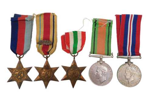 A group of WWII medals, to include 39-45 star, Italy star, Africa star with mention in...