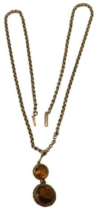 A late 19th/early 20thC citrine pendant and chain, the two layered pendant set with two citrines,...