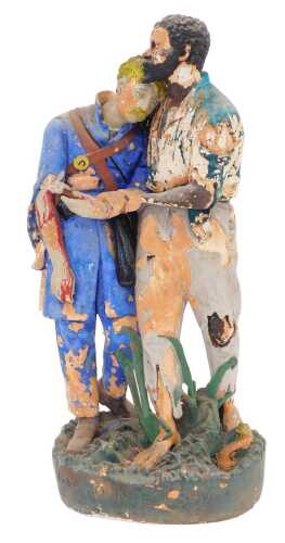 A very early 20thC plaster figure group The Wounded Scout, formed as two figures, one an...