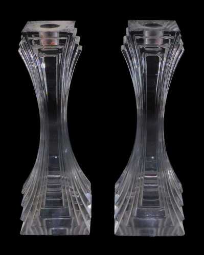 A pair of Art Deco design heavy glass candlesticks, each of stepped square form, 26cm high.