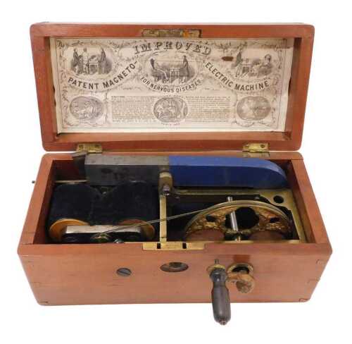 An early 20thC Patent Magneto improved electric shock machine, in rectangular mahogany case,...