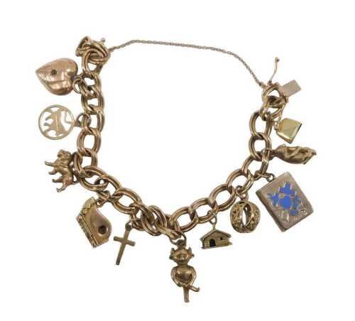 A 9ct gold charm bracelet, the double curb bracelet, with safety chain and sliding clasp, with...