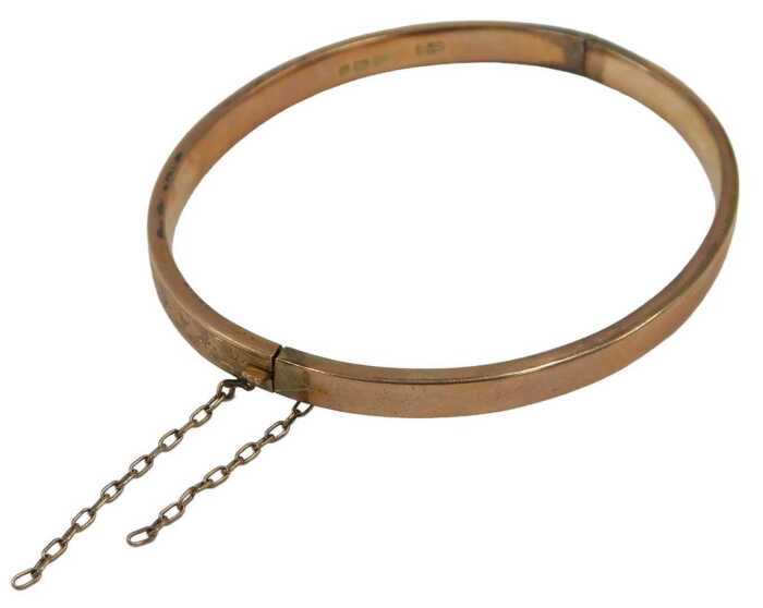 A 9ct rose gold half hinged bangle, with part floral design, 6cm diameter, 5.1g, boxed.
