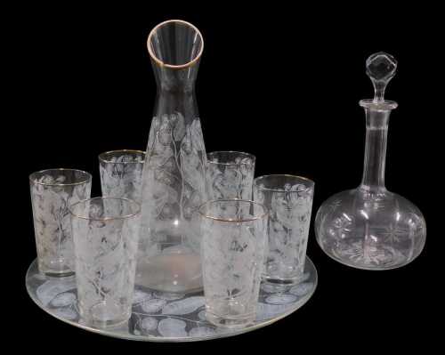 A 20thC etched glass drinks set, comprising carafe style decanter, 31cm high, six beakers, and...