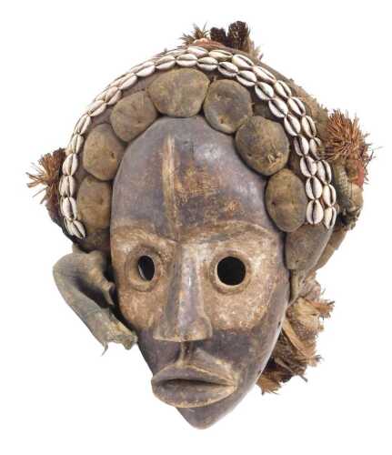 A Dan tribal mask, 48cm deep.