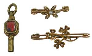 Two seed pearl set bar brooches, comprising one formed as three spray three leaf cover, 3cm wide,...