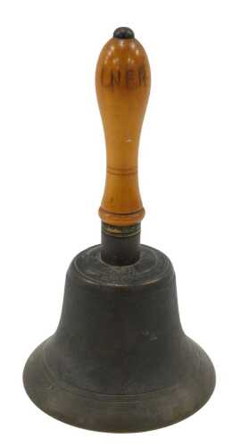 An LNER stamped hand bell, with inverted wooden handle, 20cm high.