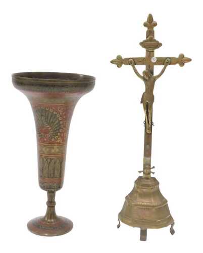 An early 20thC brass crucifix statue, 41cm high, and an Indian brass vase, decorated with...