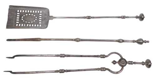 A Regency style steel three-piece fireside companion set, comprising shovel, 71cm high, coal...